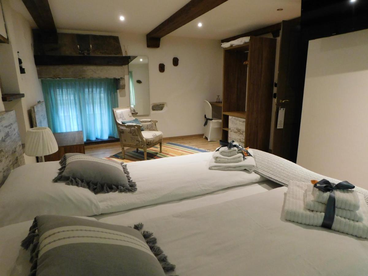 Nicomat Rooms โดโมดอสโซลา ภายนอก รูปภาพ
